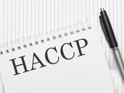 Words haccp text on notepad and pen